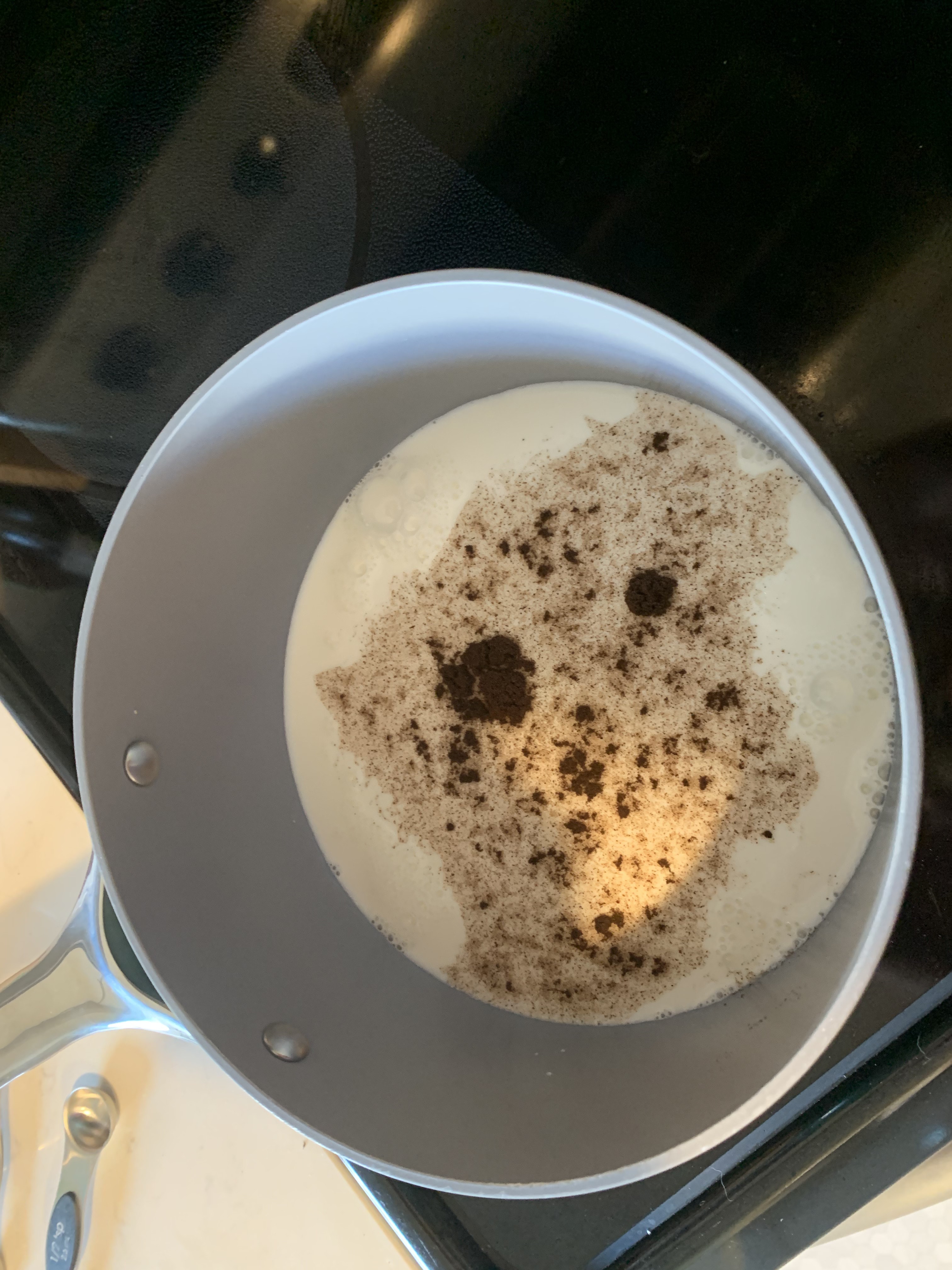 Milk and vanilla in saucepan