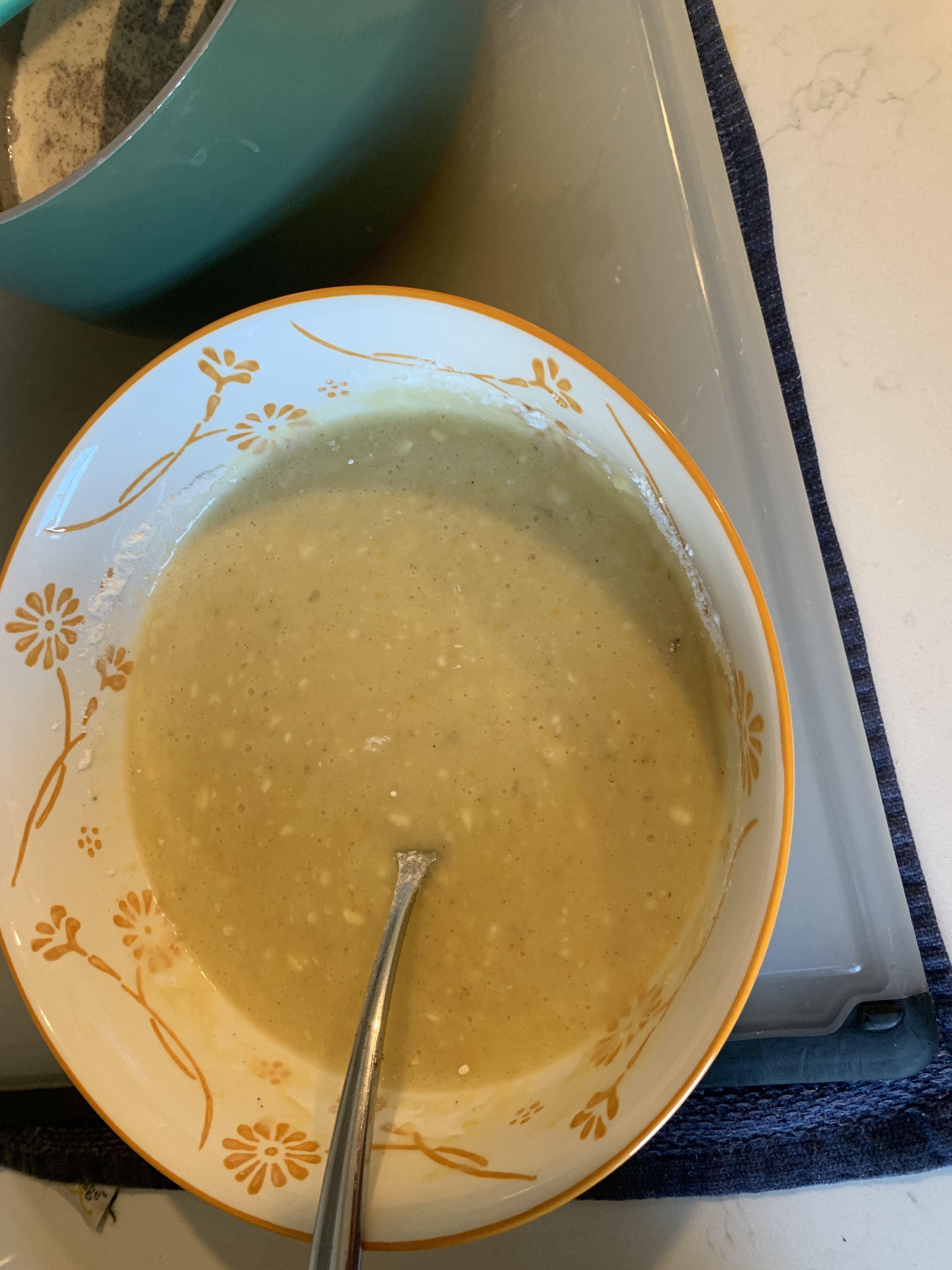 Tempering the eggs with hot milk