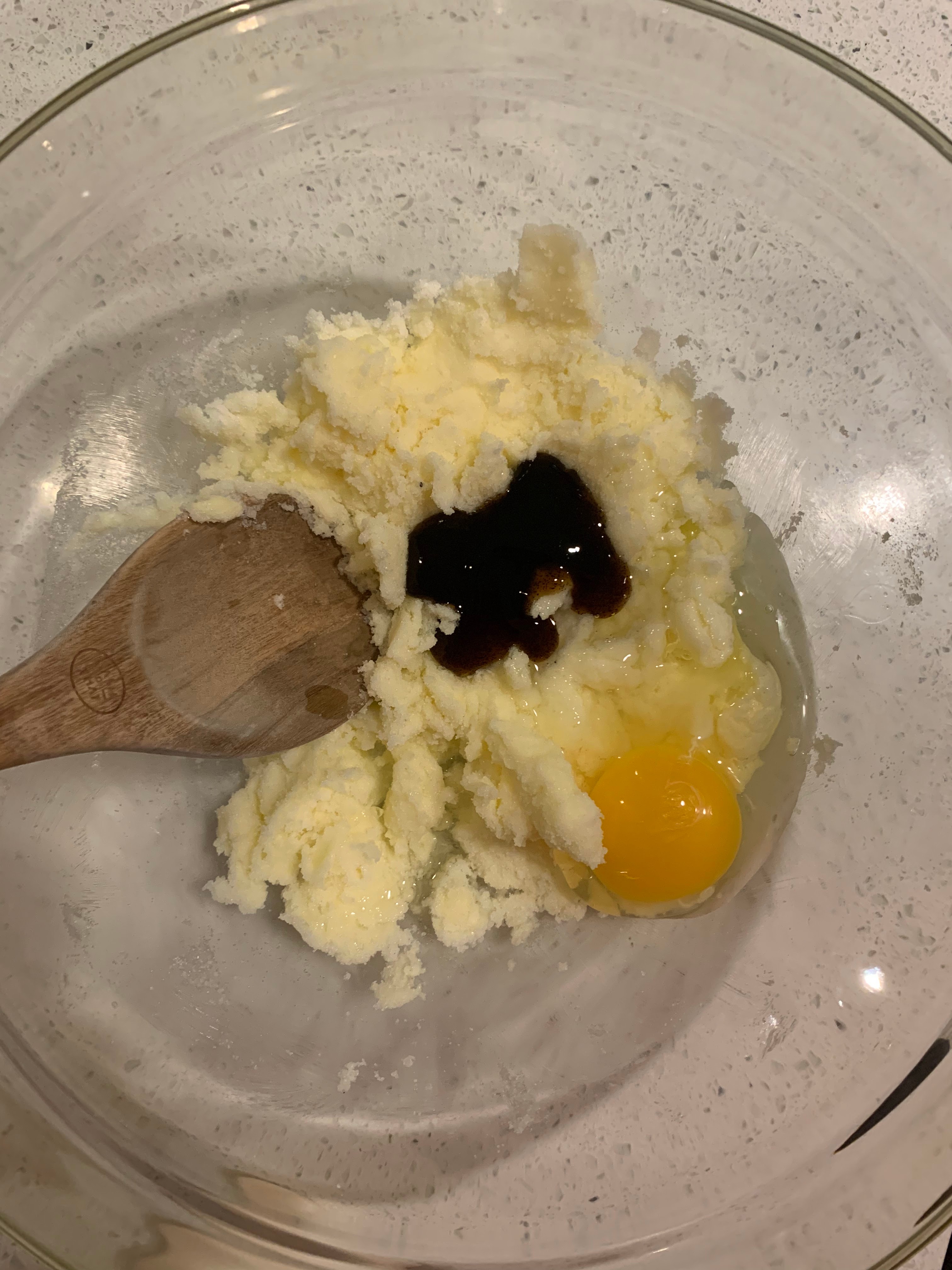 Egg and extracts added to creamed butter