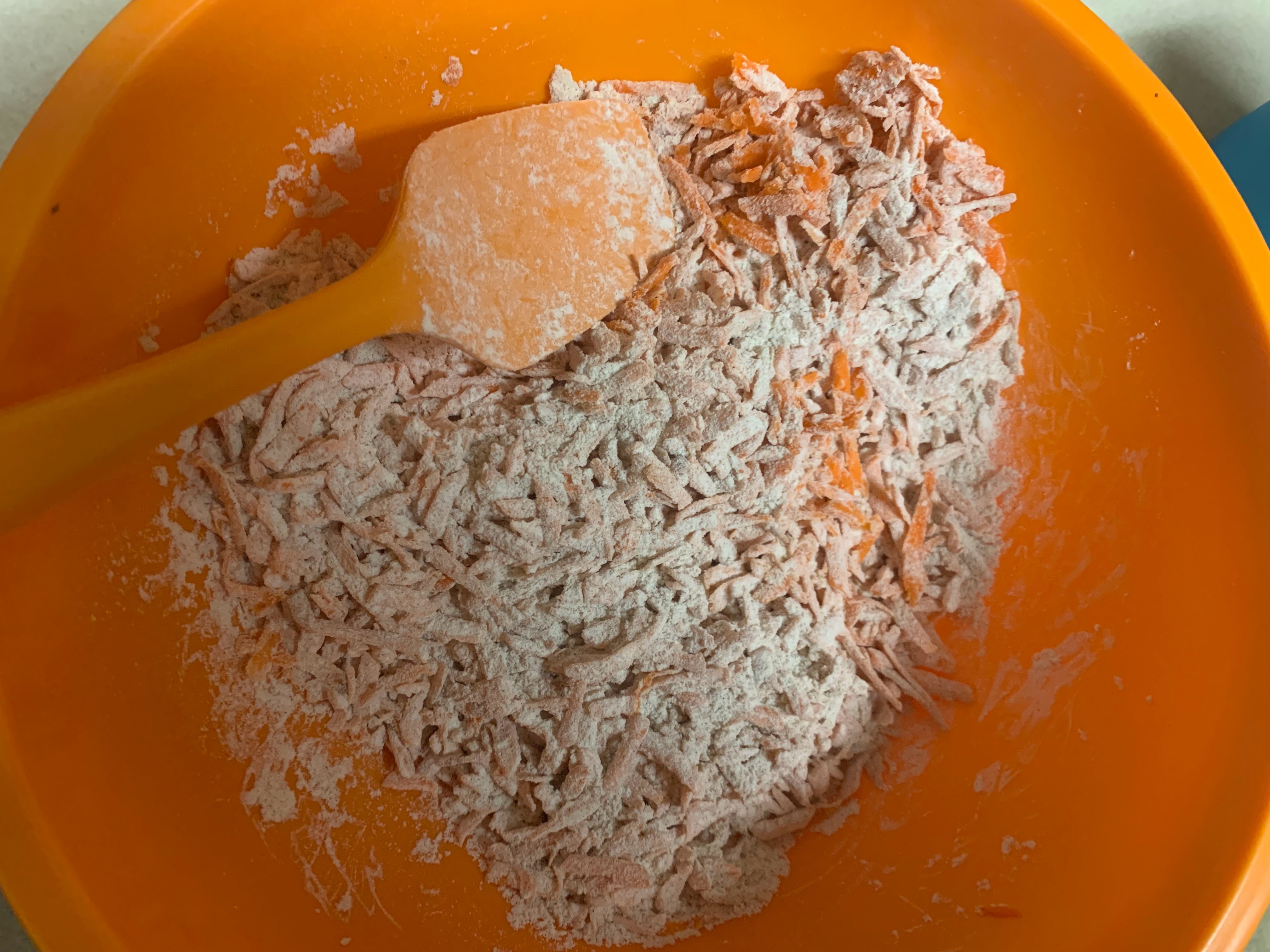 Carrots mixed into dry ingredients