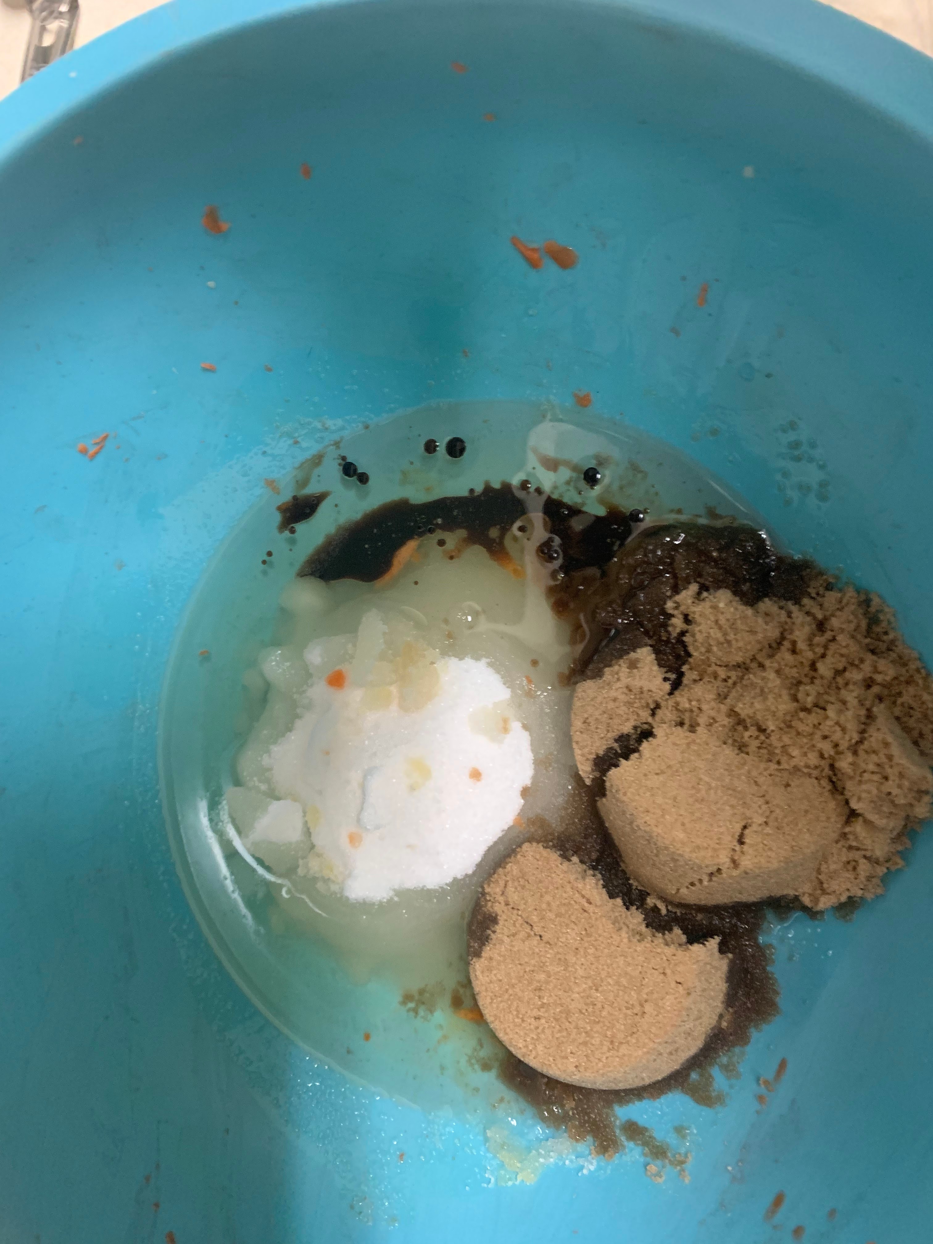 Oil, sugars and vanilla mixed together