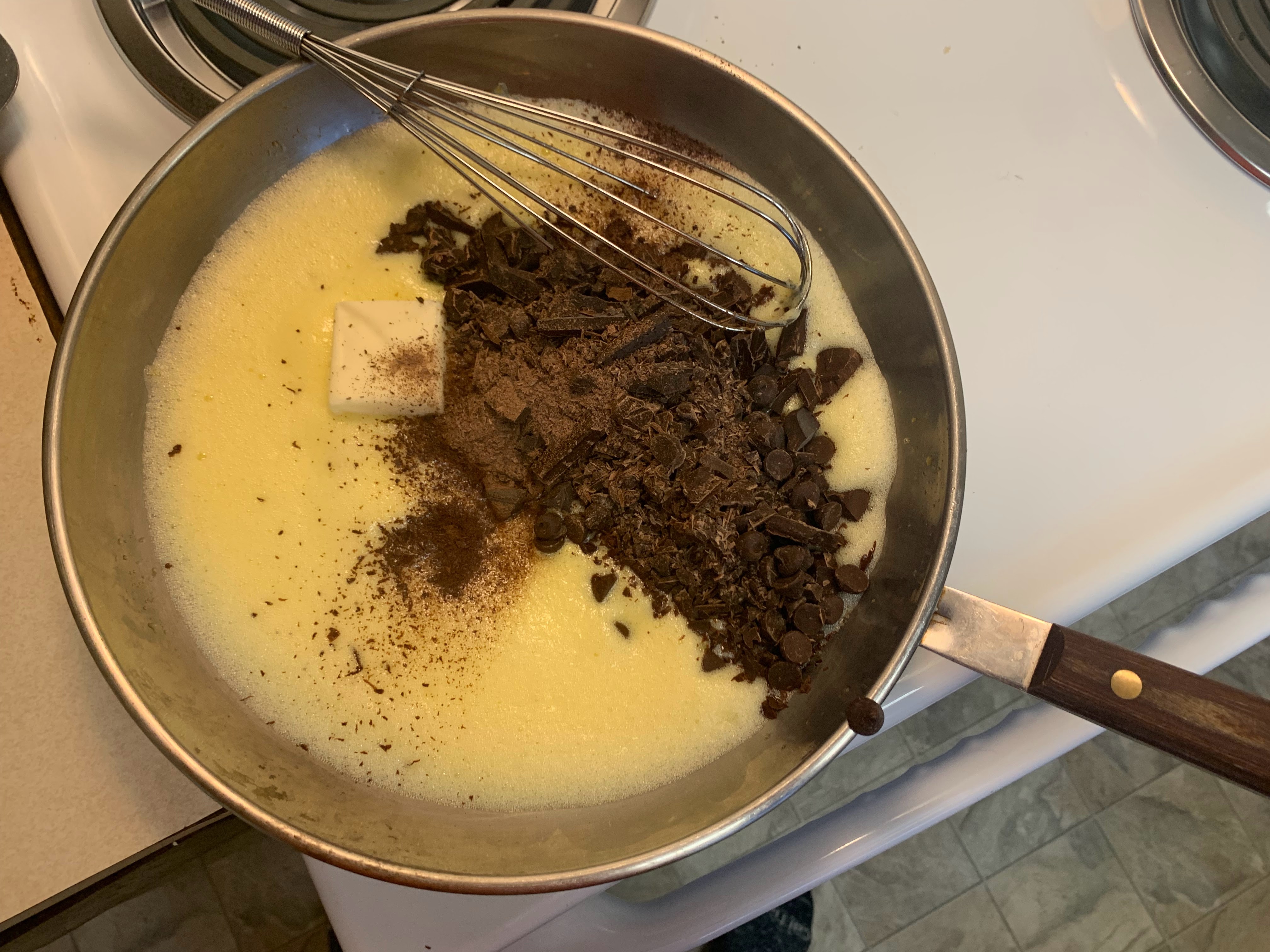 Chocolate and butter added to hot egg base